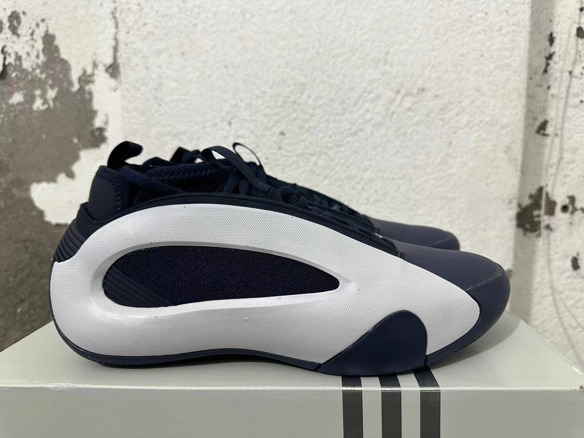 Navy and White Adidas Basketball Shoes - product image from the listing.