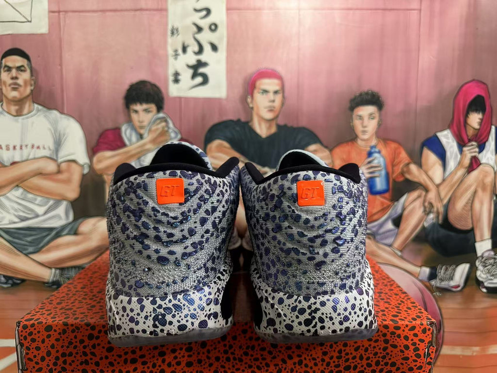 Nike Basketball Footwear, Gray and Orange Speckled Design - product image from the listing.