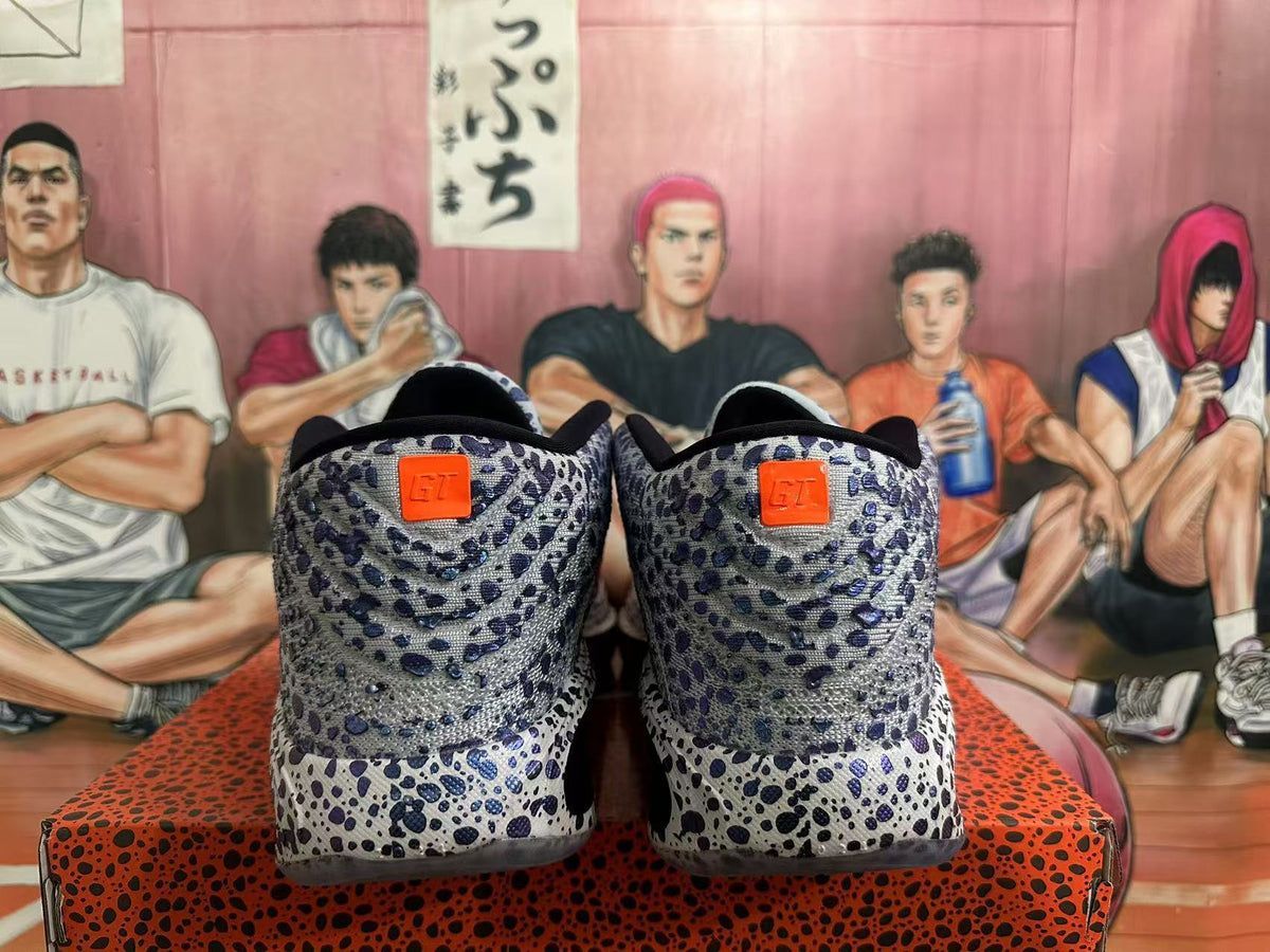 Nike Basketball Footwear, Gray and Orange Speckled Design - product image from the listing.