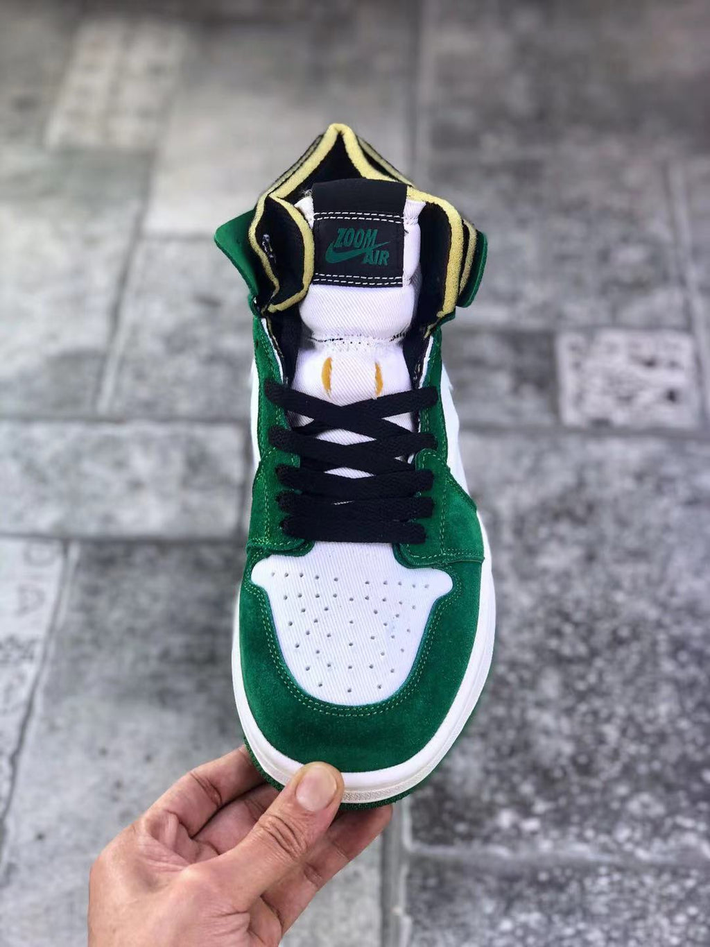Jordan 1 Zoom CMFT Sneakers in Green White CT0978-300 - product image from the listing.