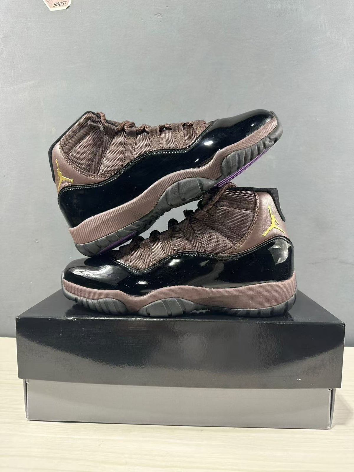 Air Jordan 11 Retro Black Bronze High-Top Sneakers - product image from the listing.