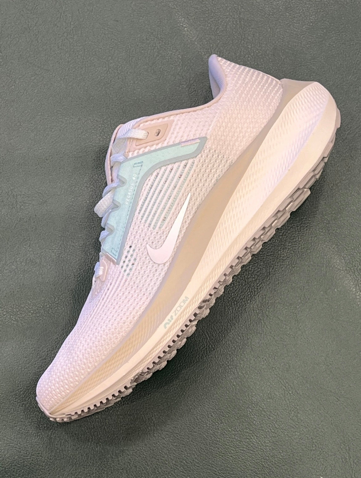 Nike Air Zoom Pegasus 40 Running Shoes FN7629-030 in Mint Green - product image from the listing.