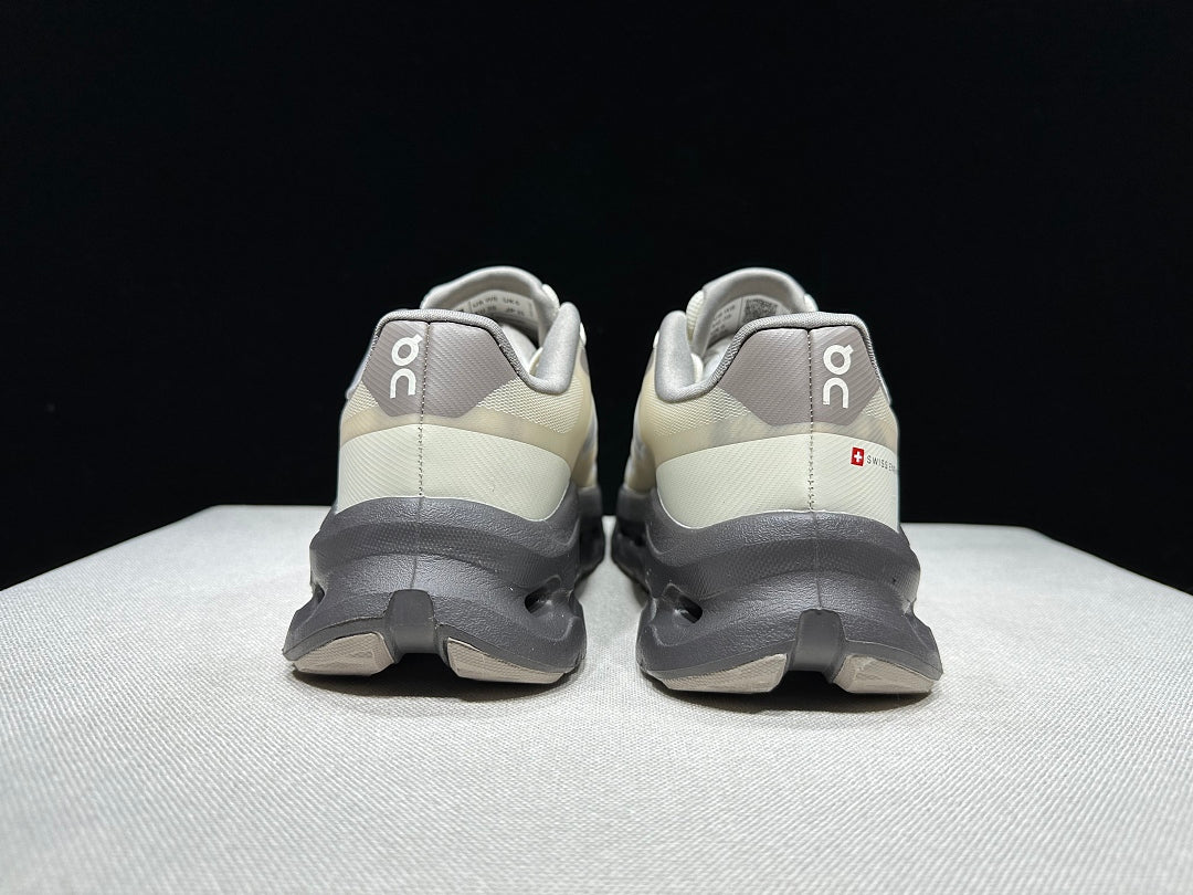 On Cloudtilt Remix Trainers in White and Pebble - product image from the listing.