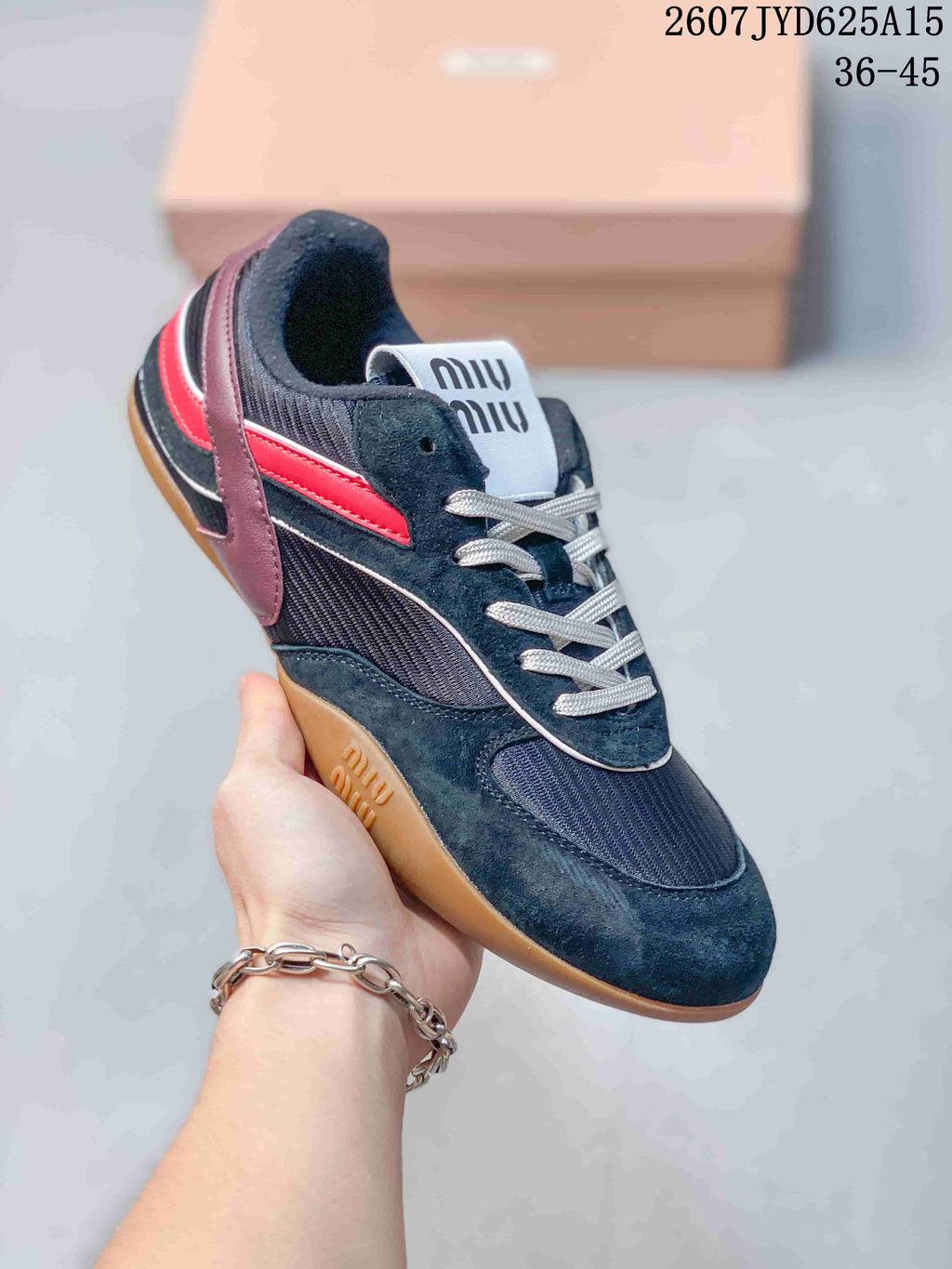 Miu Miu Gymnasium Low-Top Sneakers in Black Red 2607JYD625A15 - product image from the listing.