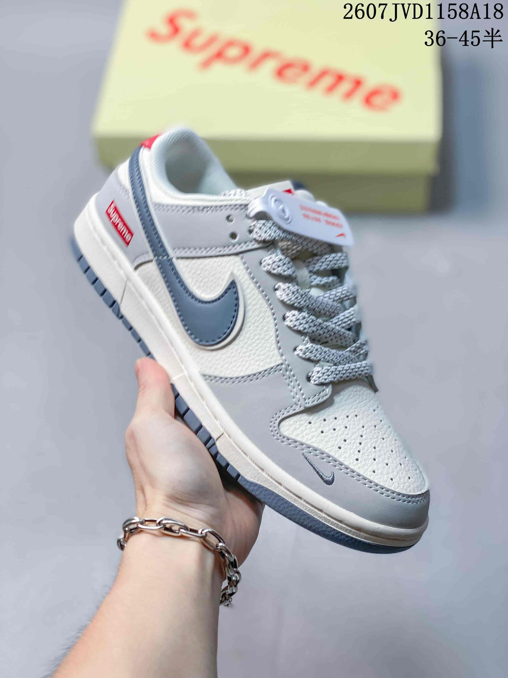 Nike SB Dunk Low Sneakers in Gray White Black - product image from the listing.