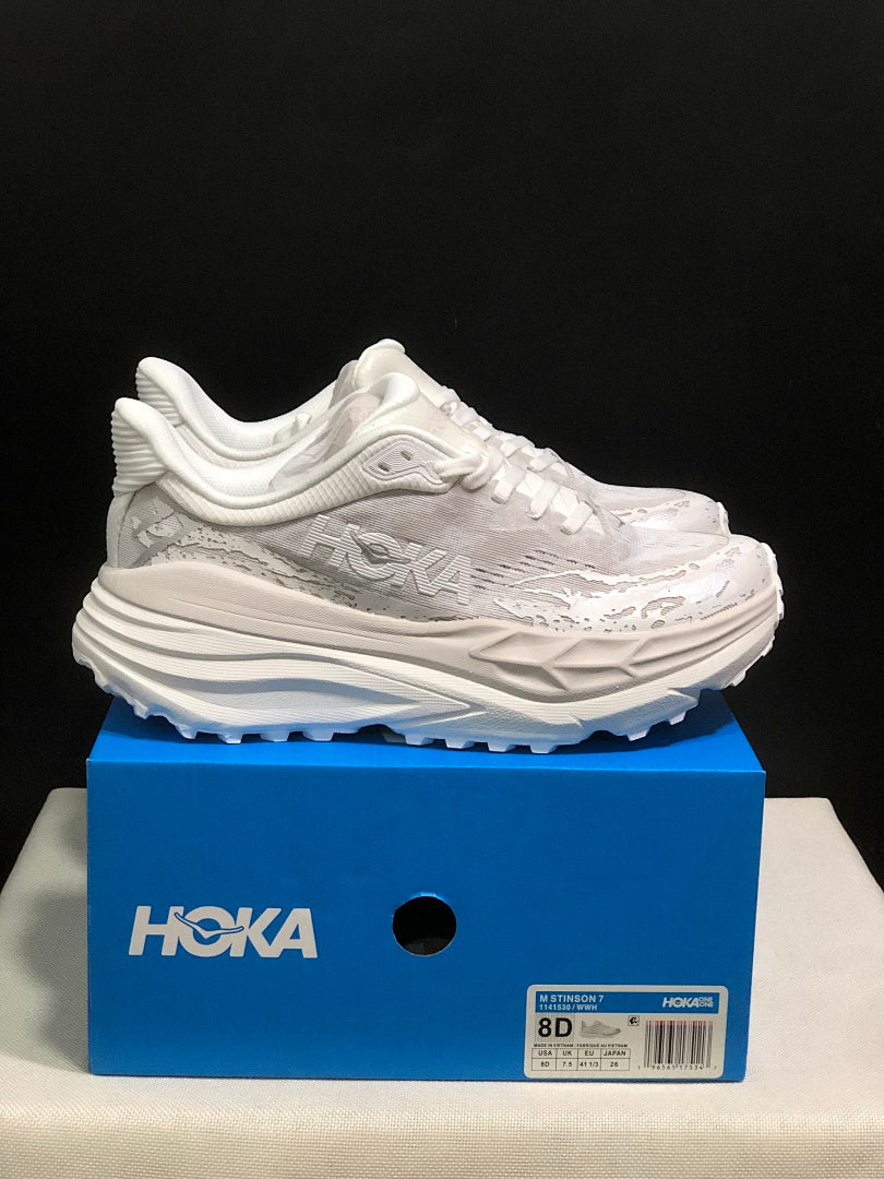 HOKA Stinson 7 Sneakers in White and Gray - product image from the listing.