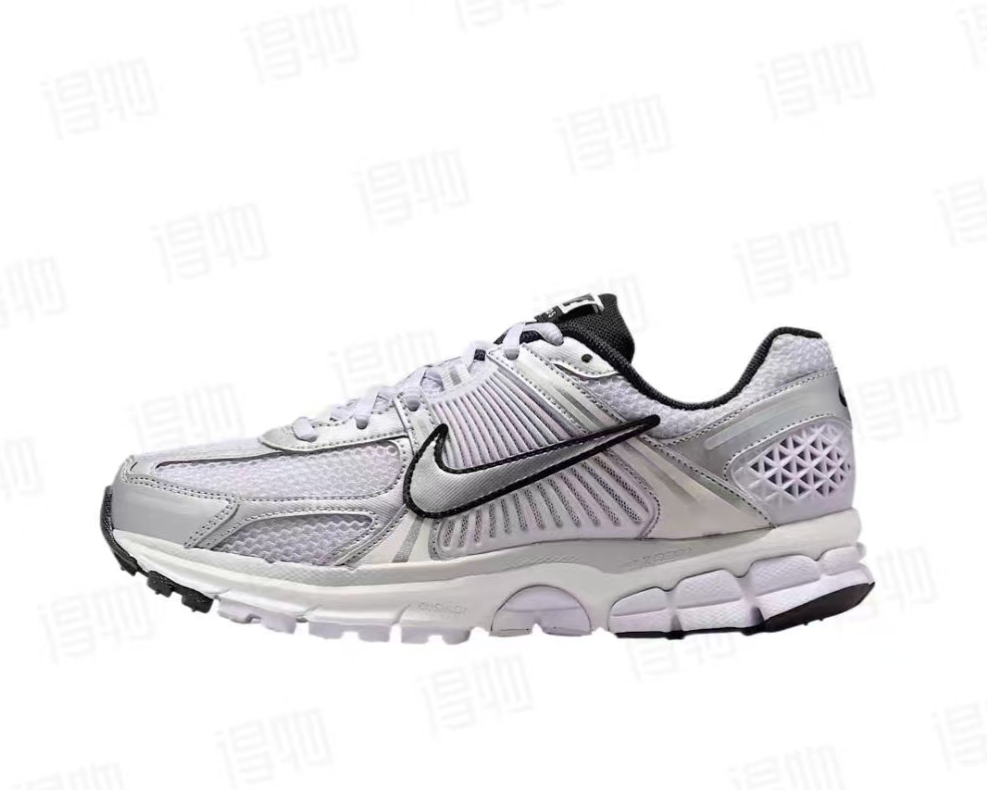 Nike Air Zoom Vomero 5 Running Shoes, in White and Black - product image from the listing.