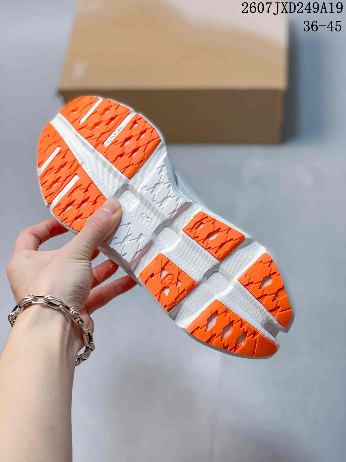 ON Cloudmonster 3 Hyper Sneakers in Orange 711490EEU - product image from the listing.