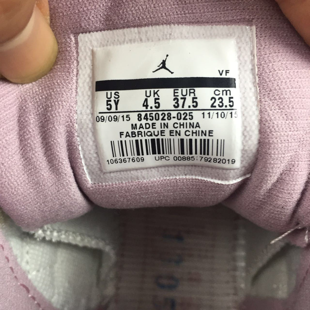 Air Jordan 12 Cherry Blossom Pink Sneakers - product image from the listing.