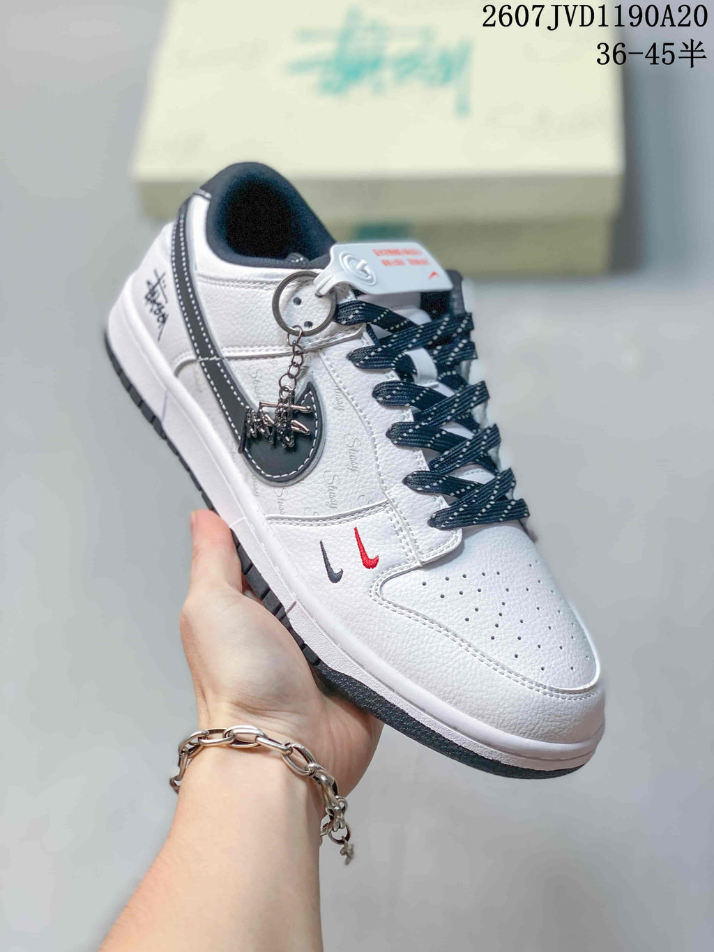 Nike SB Dunk Low Stüssy Sneakers in Off-White Black - product image from the listing.