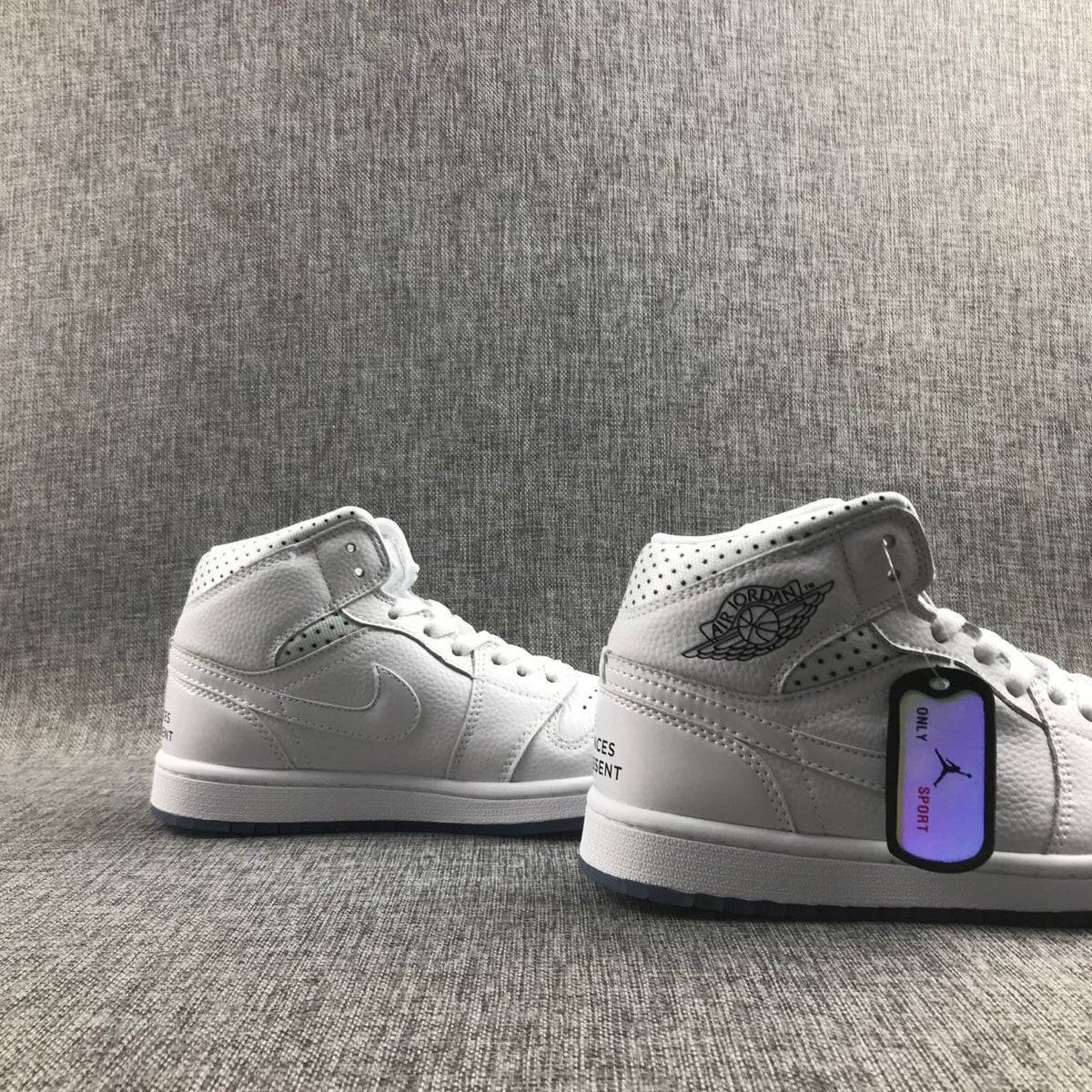 Air Jordan 1 Mid Unite Totale Sneakers in White CI9100-100 - product image from the listing.