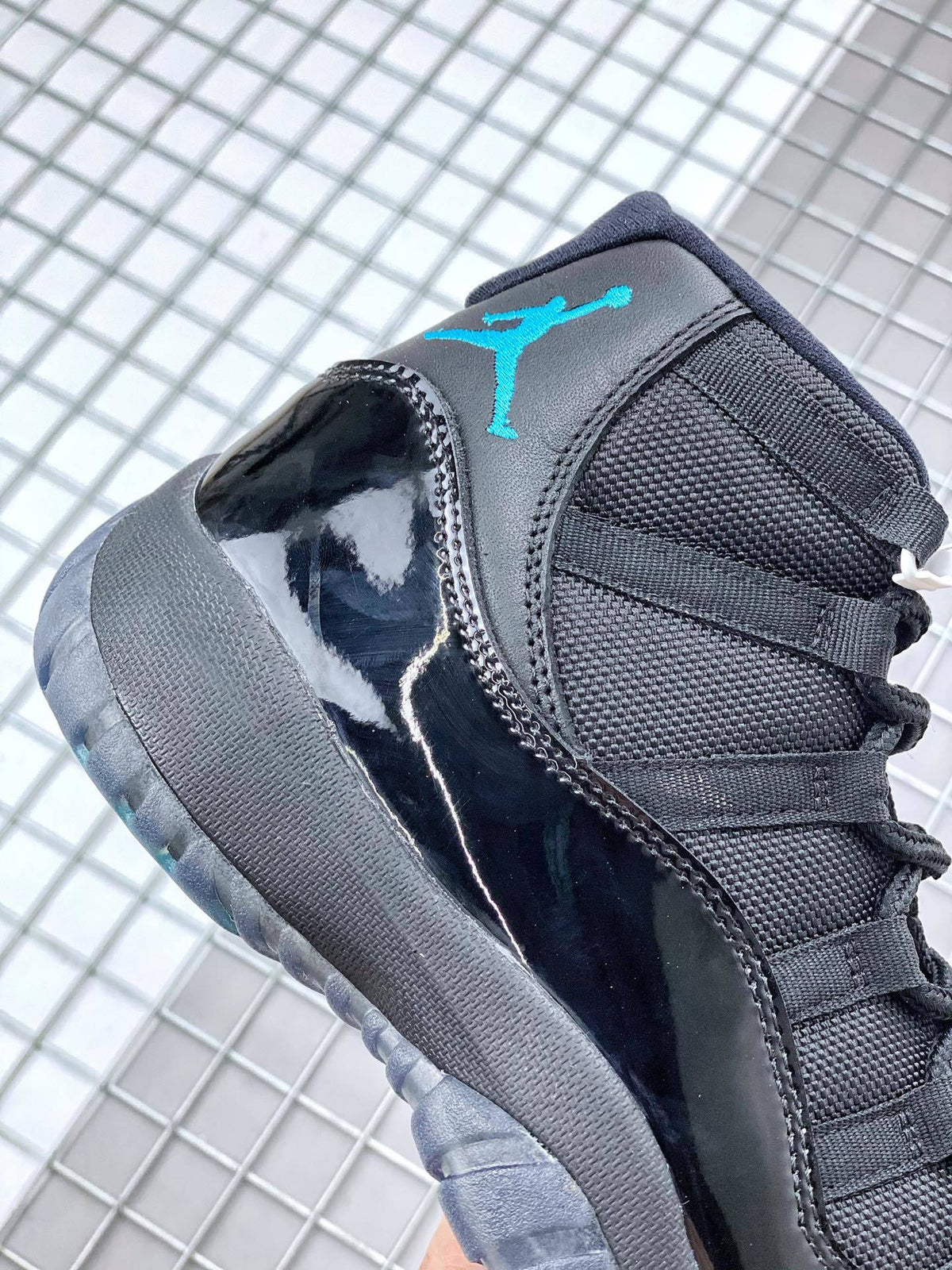 Air Jordan 11 Retro Gamma Black Sneakers 378037-006 - product image from the listing.