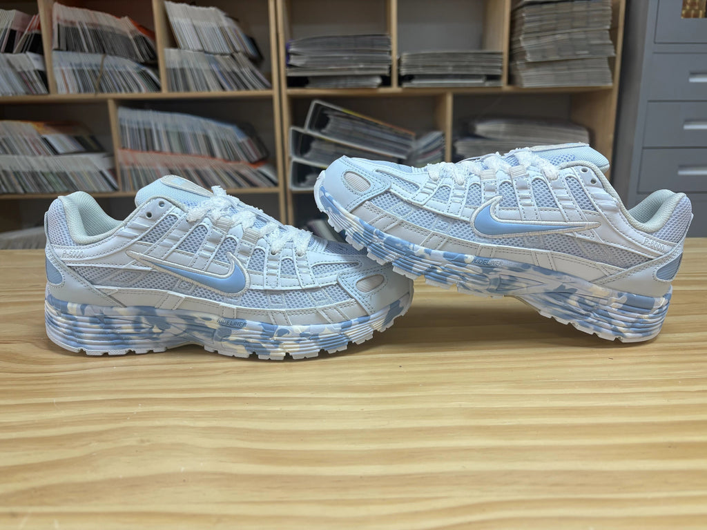 Nike P-6000 Sneakers in White and Blue CV2209-111 - product image from the listing.