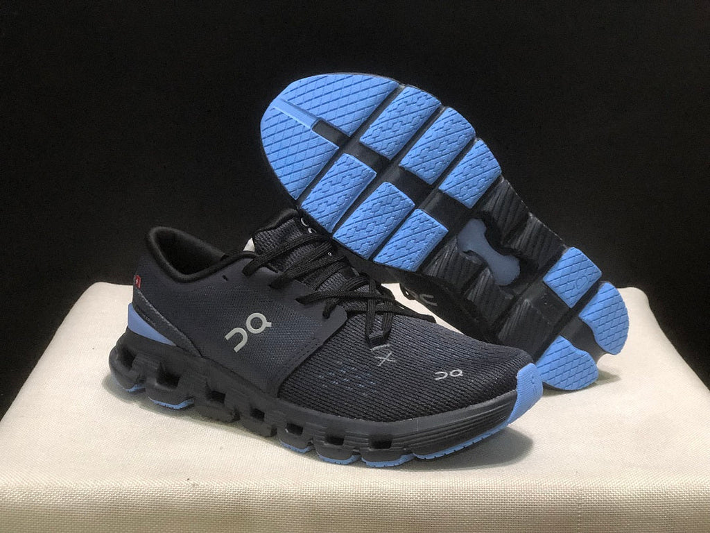 On Cloud X 4 Running Sneakers in Navy - product image from the listing.