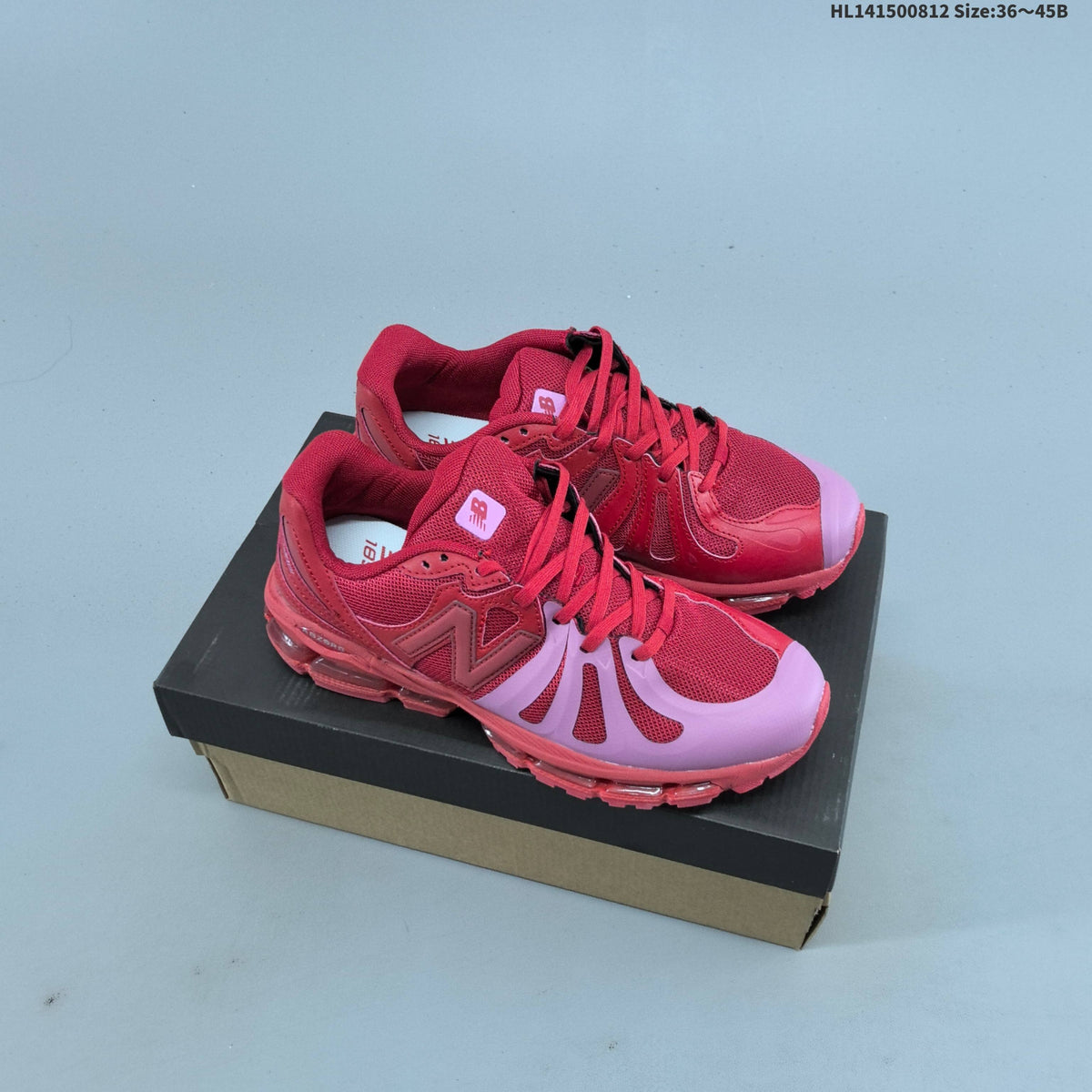 Red and Pink New Balance 18907 Sneakers - product image from the listing.