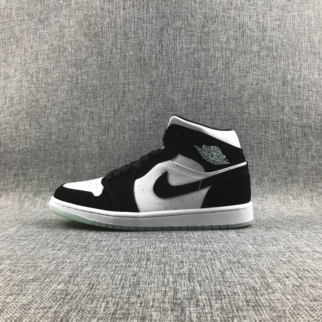 Air Jordan 1 Mid Sneakers in Black White Mint BQ6931-103 - product image from the listing.