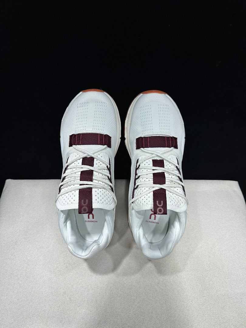 On Cloudnova 2 Sneakers, in White and Burgundy - product image from the listing.