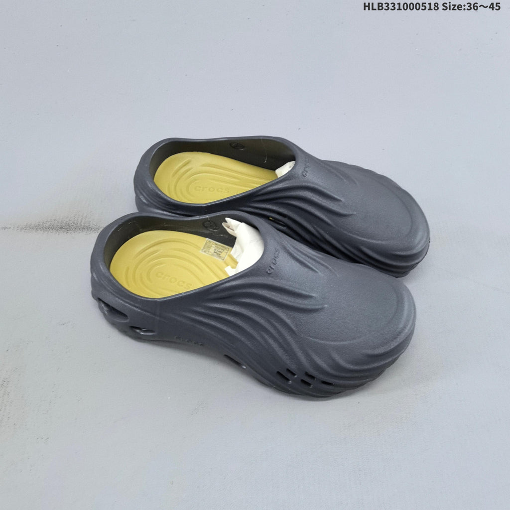 Bae Clog-Style Slides with Sculpted Design by Crocs - product image from the listing.