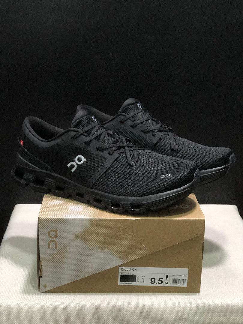 On Cloud X 4 Black Eclipse Trainers - product image from the listing.