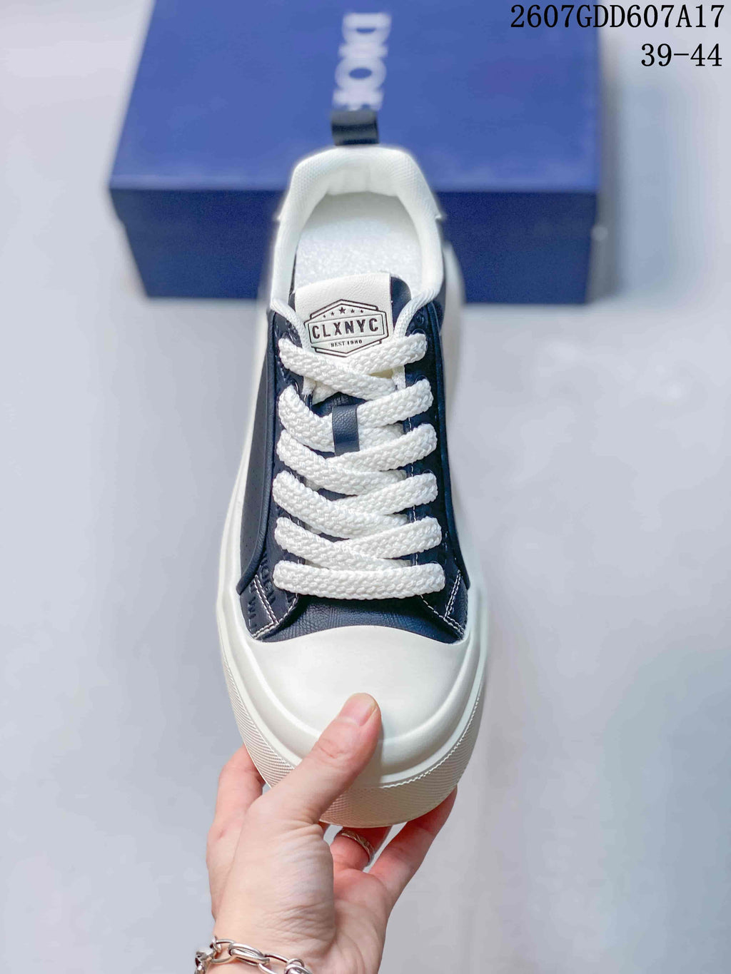 Dior 2607GDD607A17 Low-Top Sneakers in Navy White - product image from the listing.