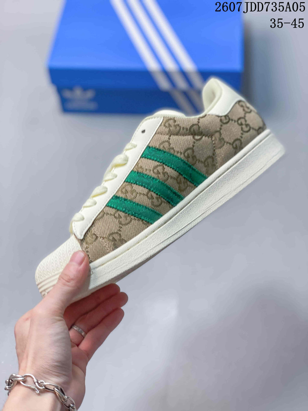 adidas Superstar Trainers Beige Green Shell-Toe Style 2607JDD735A05 - product image from the listing.