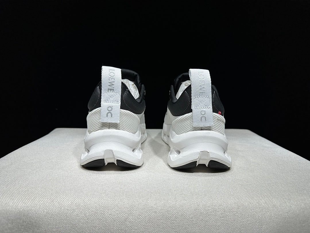 On Cloudtilt 2.0 Sneakers in White and Black - product image from the listing.