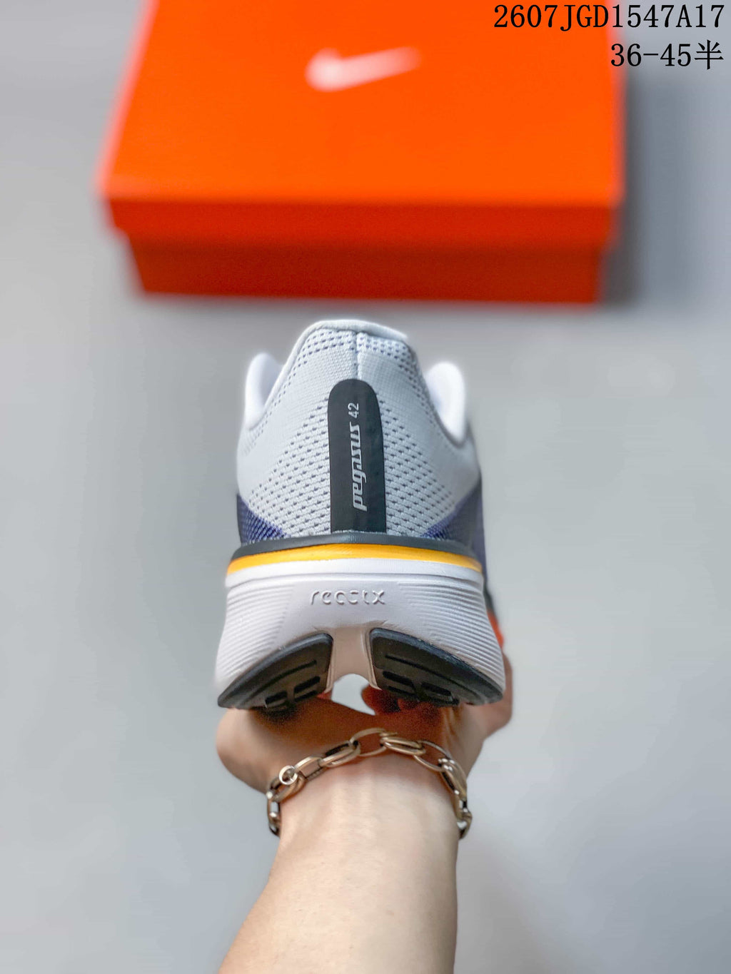 Nike Air Zoom Pegasus 42 Running Shoes in White Blue Orange - product image from the listing.