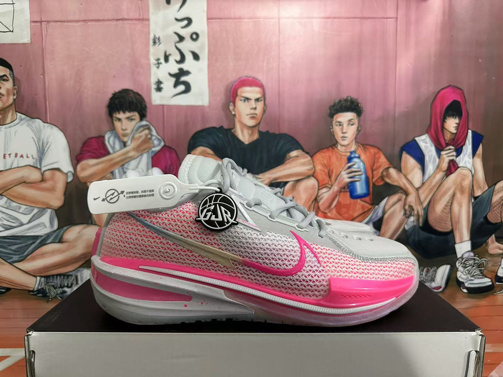Gray and Pink Nike GT Basketball Shoes - product image from the listing.