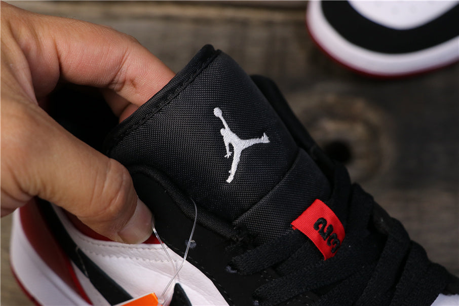 Air Jordan 1 Low Black Toe Sneakers 553558-116 - product image from the listing.