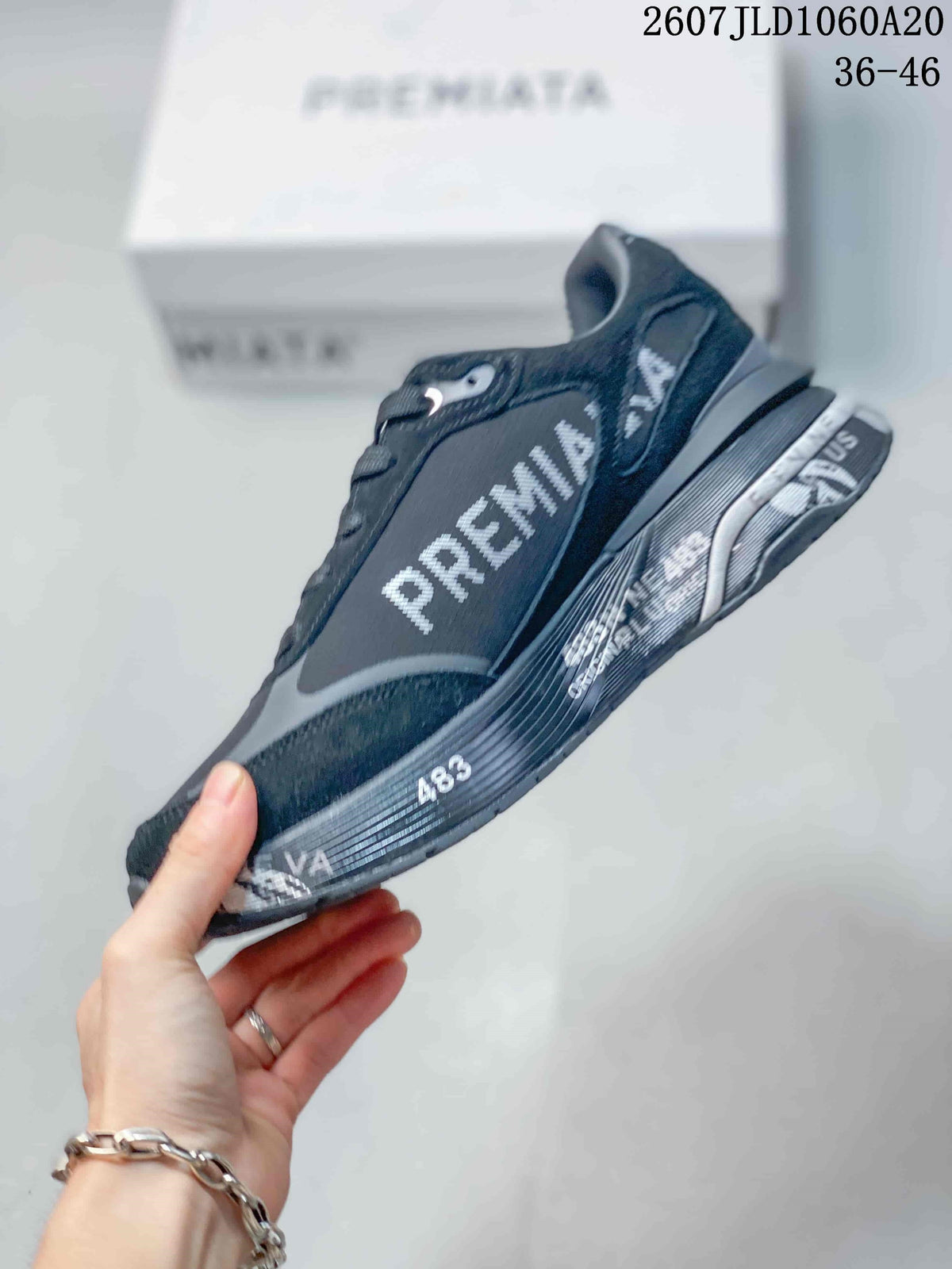 Premiata Lander Trainers in Black and Gray 712800TIT - product image from the listing.