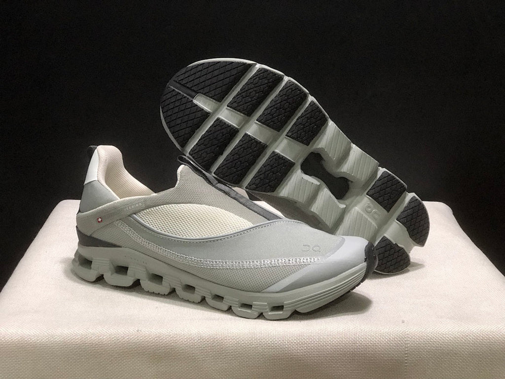 On Cloud 4 Coast Slip-On Sneakers, in Dark Grey - product image from the listing.