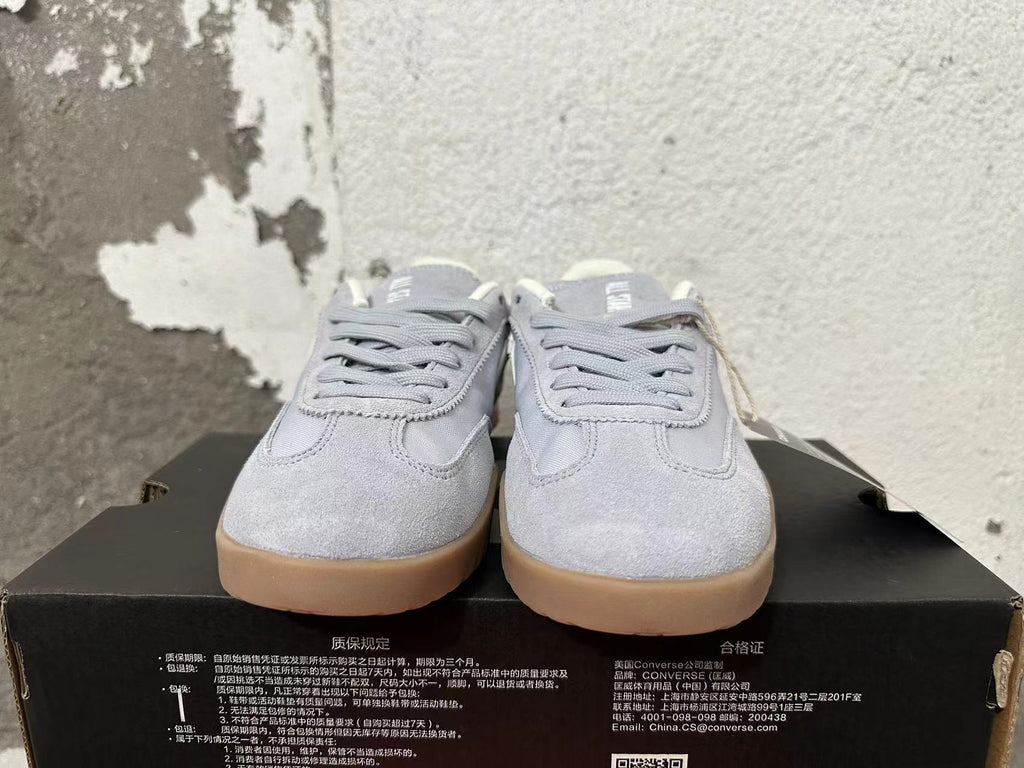 Gray and Gum Converse Trainer-Style Sneakers - product image from the listing.