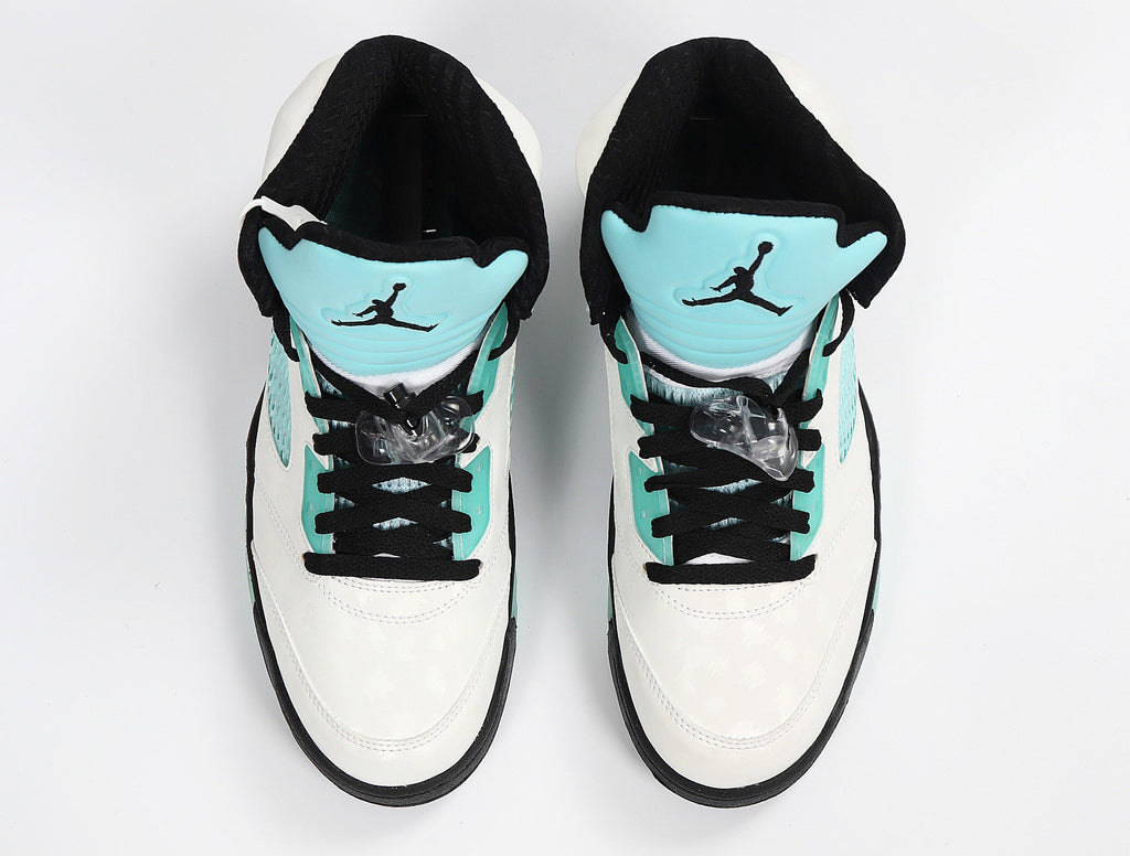 Jordan 4 Retro Sneakers in White and Mint CN2932-100 - product image from the listing.