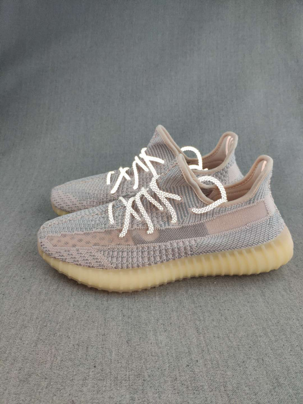 Gray and Cream Yeezy 350 V2 Knit Sneakers - product image from the listing.