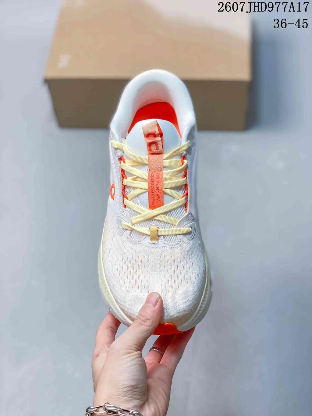 On Cloudtilt Sneakers in White Orange - product image from the listing.