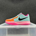 Nike Basketball Sneakers in Mint, Orange, in Pink and Black - product image from the listing.