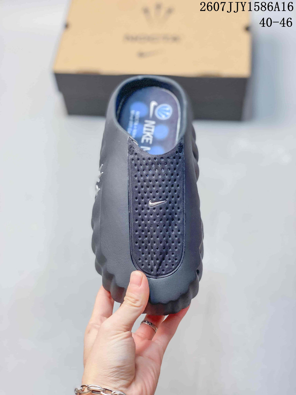 Black Nike Mind 001 Closed-Toe Slides - product image from the listing.