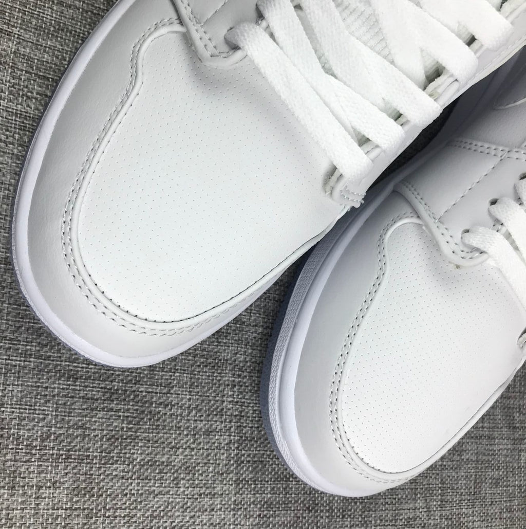 White Sneakers with Translucent Outsole - Air Jordan 1 Mid - product image from the listing.