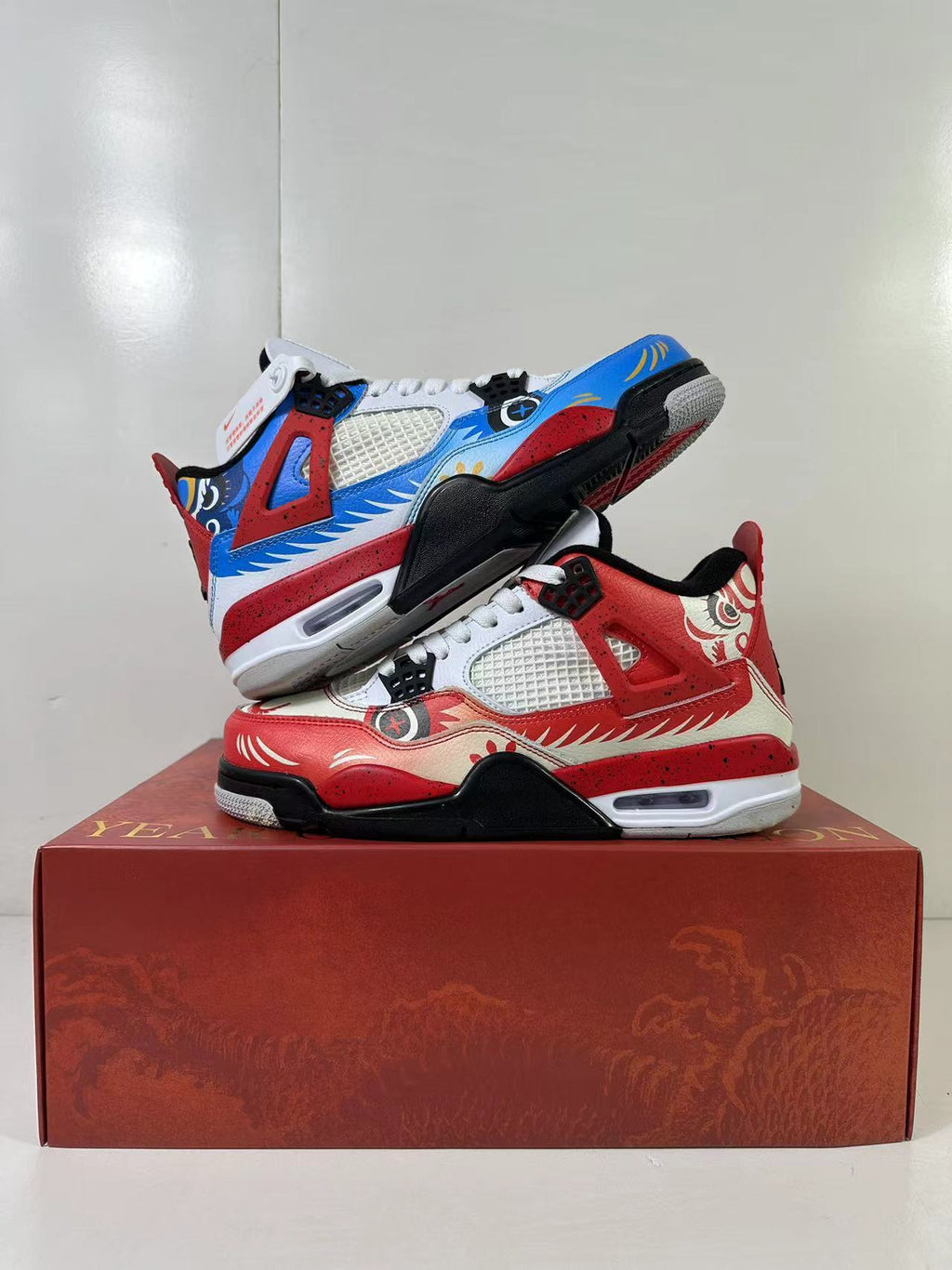 Air Jordan 4 Chinese New Year Red Blue Sneakers DH6927-161 - product image from the listing.