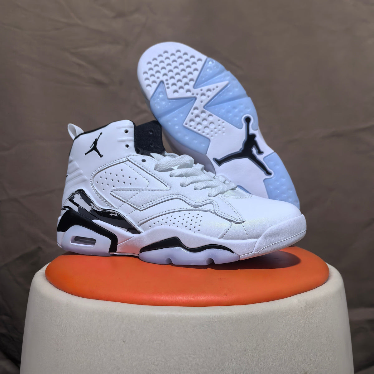 Jordan 6 Retro High-Top Sneakers in White and Black - product image from the listing.