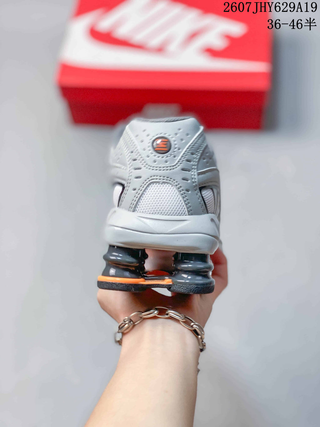 Nike Shox Ride 2 Sneakers in Grey White Orange 711395WPR - product image from the listing.