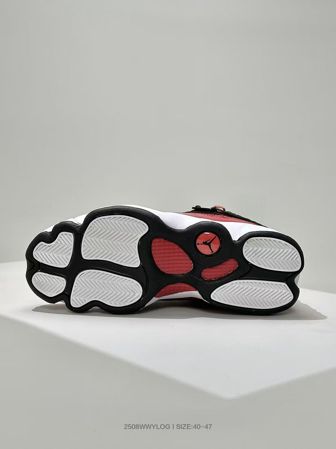 Jordan Six Rings 6-2 Sneakers in Black and Red - product image from the listing.