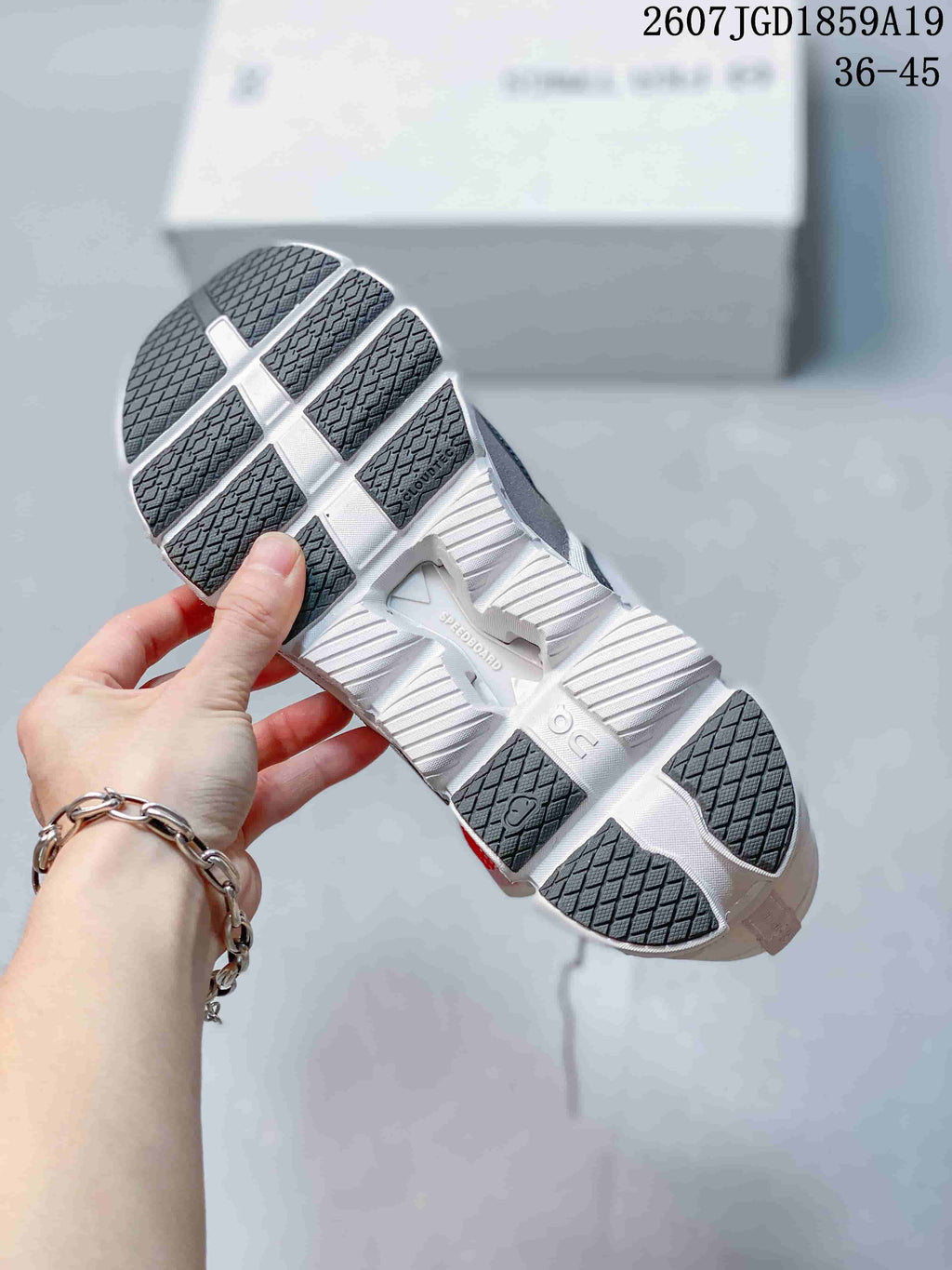 On Cloud X FKA twigs Sneakers in White Gray Red 2607JGD1859A19 - product image from the listing.