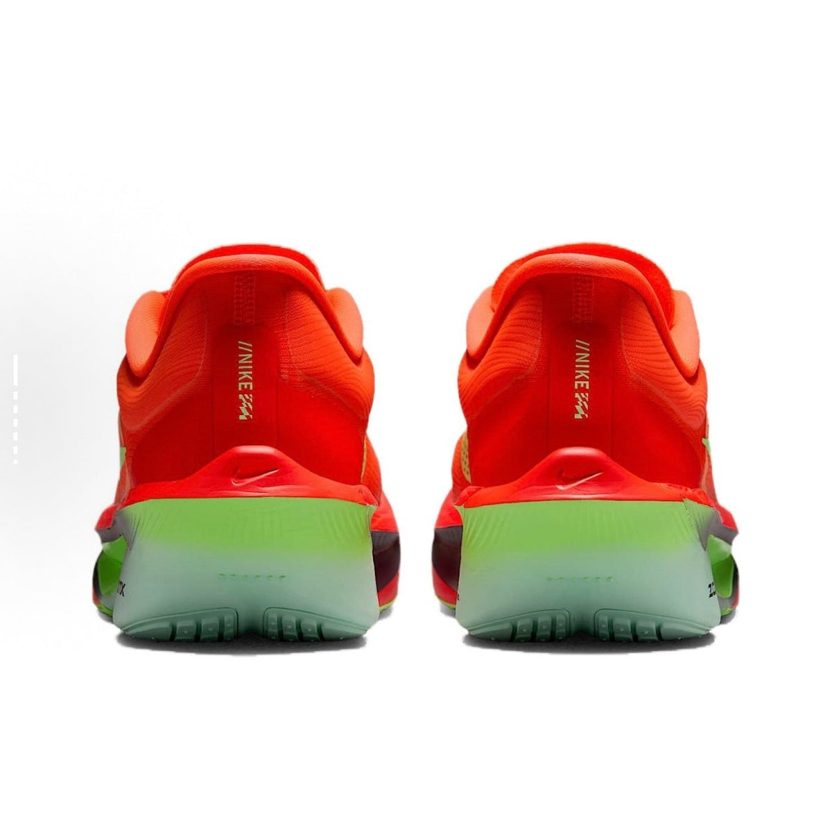 Orange and Volt Green Nike Zoom Fly Running Shoes - product image from the listing.