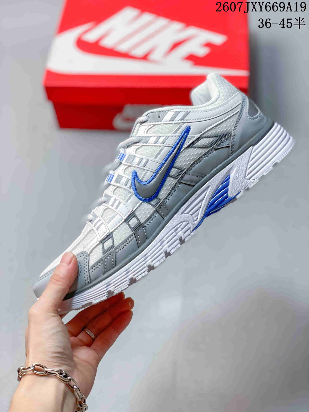 Nike P-6000 Retro Running Sneakers in White Grey Blue - product image from the listing.