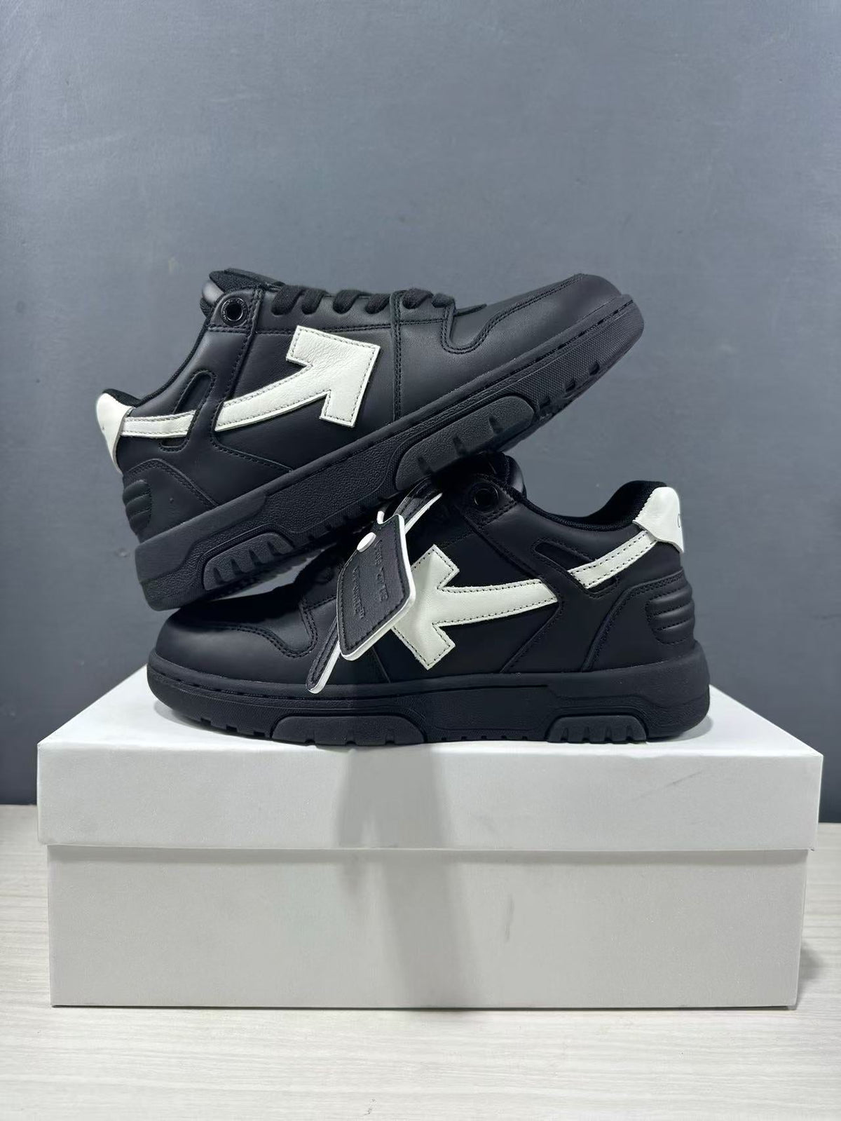 Off-White Out Of Office Low-Top Sneakers in Black White OMAI89C99LEA0191001 - product image from the listing.