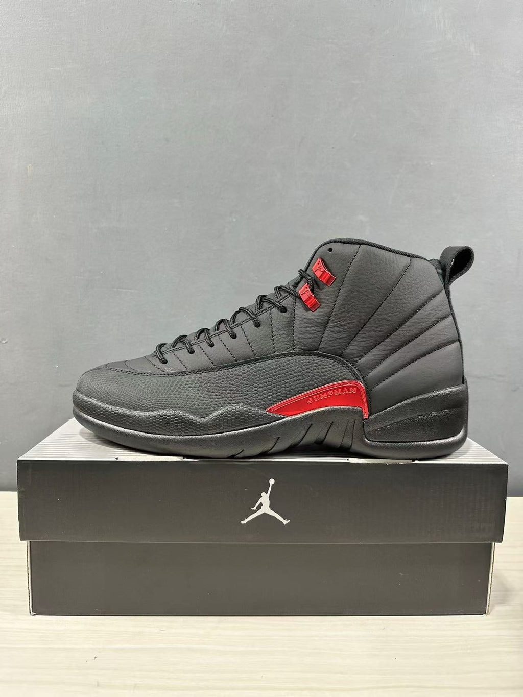 Air Jordan 12 Retro Black Red CT8013-003 - product image from the listing.