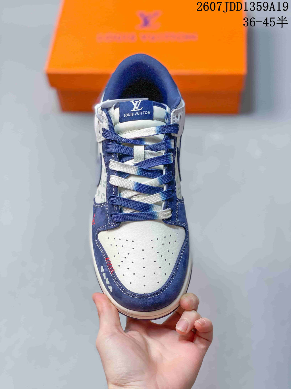 Air Jordan 1 Low Sneakers White and Navy - product image from the listing.