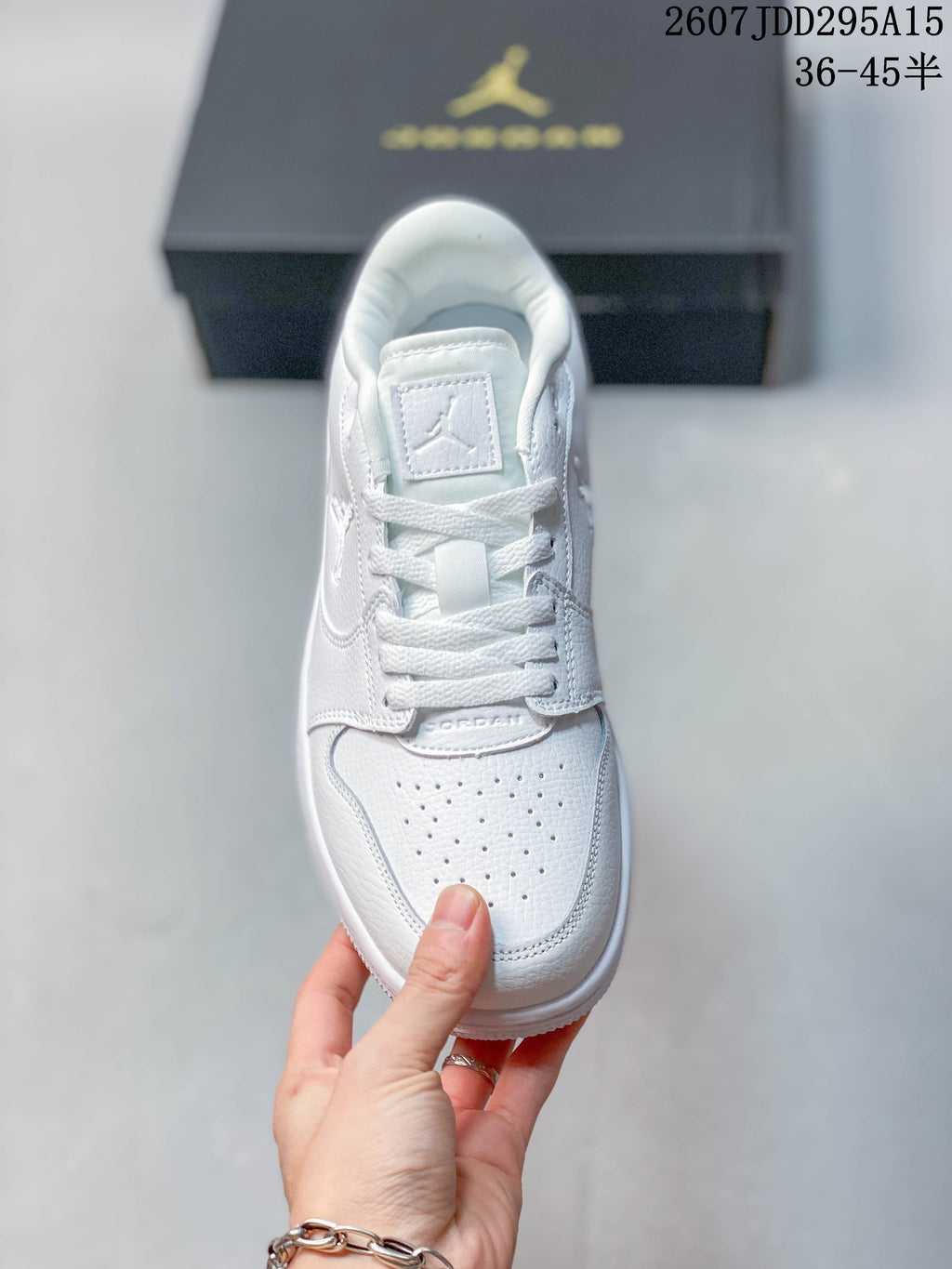 Nike Air Jordan 1 Low Sneakers in White 2607JDD295A15 - product image from the listing.