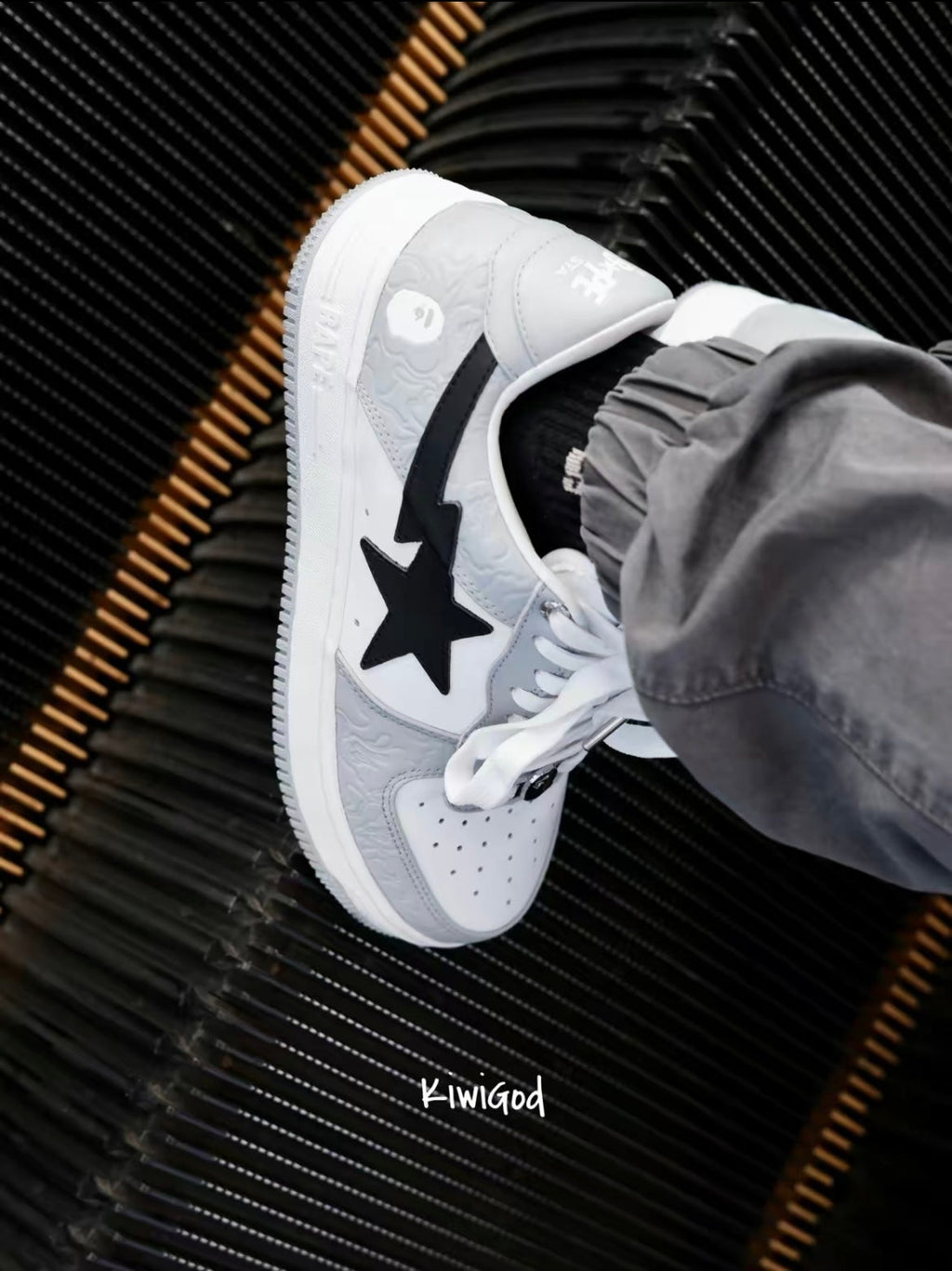 Gray and White BAPE STA Low Sneakers - product image from the listing.